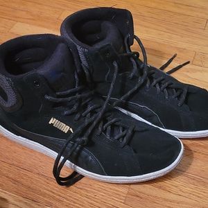 Black suede Puma high tops